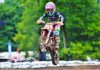 Youth motocross rider racing towards success