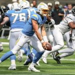 Staley sticks with ailing Herbert in Chargers’ blowout loss