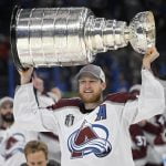 MacKinnon signs 8-year deal, highest paid in NHL
