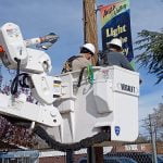 Festive holiday banners hung in Anza