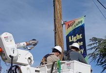 Festive holiday banners hung in Anza