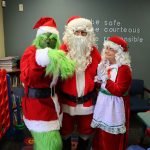 Santa, Mrs. Claus and the Grinch entertain students at Hamilton Saturday school