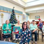 Memory care residents host virtual holiday story time for 5th graders