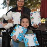 Hundreds of youth celebrate the holidays courtesy of a Christmas drive thru