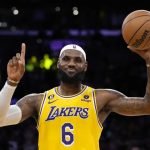 LeBron James makes NBA history on a star-filled night in LA