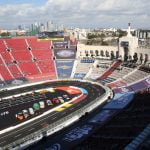 Truex wins NASCAR’s sloppy return to Los Angeles Coliseum