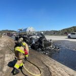 Engulfed semi prompts HAZMAT response
