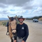Marine Corps veteran Matt Perella and his horse Buck trot through Anza on their journey to raise awareness of PTSD