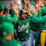 A’s hit 5 home runs, rally for 11-10 win over Angels in 10