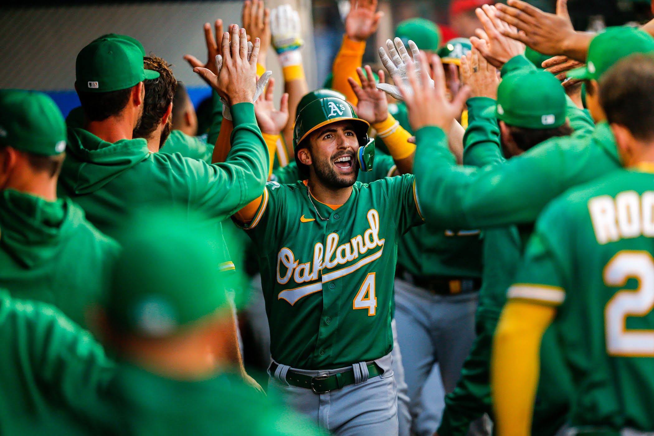 A's hit 5 home runs, rally for 11-10 win over Angels in 10