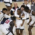 A San Diego St-UConn title game brings Fab Five memories