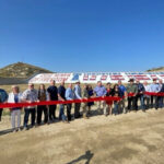 Ribbon cutting celebrates the completed restoration of historic Prado Dam bicentennial mural