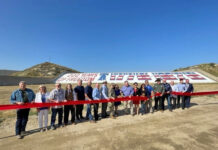 Ribbon cutting celebrates the completed restoration of historic Prado Dam bicentennial mural