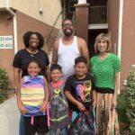 Local author partners with COM for school supply giveaway and community engagement