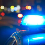 Head-on crash on SR-371 leaves one dead, two seriously injured Police car on the street at night.