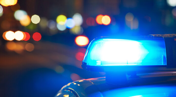 Head-on crash on SR-371 leaves one dead, two seriously injured Police car on the street at night.