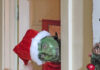 Grinch surprises children at ACIL’s Cookies with Santa event