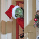 Grinch surprises children at ACIL’s Cookies with Santa event