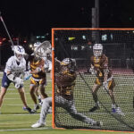 Broncos ride to victory, take the top spot in boys’ lacrosse standings