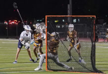 Broncos ride to victory, take the top spot in boys’ lacrosse standings