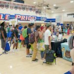 Over 1,400 Students receive free shoes and backpacks at Back to School Resource Fairs