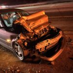 One person transported after sedan vs semi accident