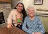 Homeschool students craft cards with Vineyard Place residents