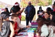 At-risk youth celebrate the holidays courtesy of Community Outreach Ministry