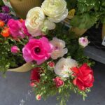 A rainbow of ranunculus flowers can be found in Carlsbad
