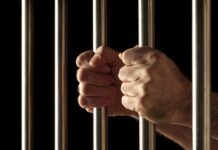 California released 15,000 prisoners early during COVID. New data reveals what happened to many of them Prison bars