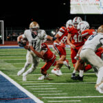 Local prep football teams battle through Week Zero season openers