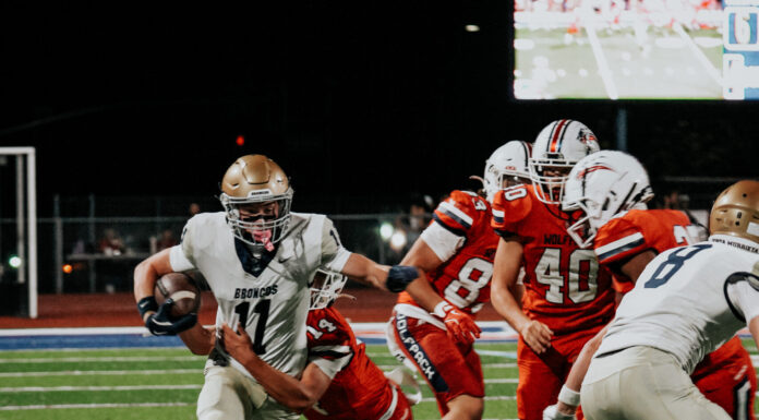 Local prep football teams battle through Week Zero season openers