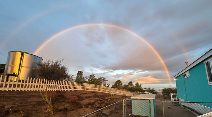 Double rainbow arches over Anza as storm moves in
