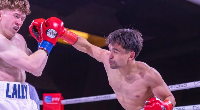 Lorenzana claims title, Pacquiao debuts in electric night at Pechanga