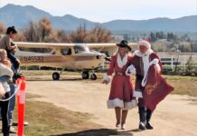 Santa’s high-flying arrival delights families at Lake Riverside Estates