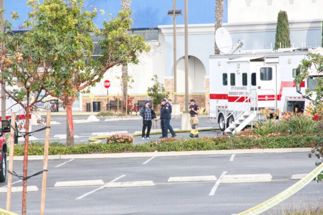 San Marcos Fire Department IC (Incident Command) trailer with IC staff talking to a Tesla security personnel